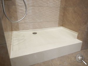 Отделка ванной комнаты изделиями из искусственного акрилового, кварцевого и натурального камня